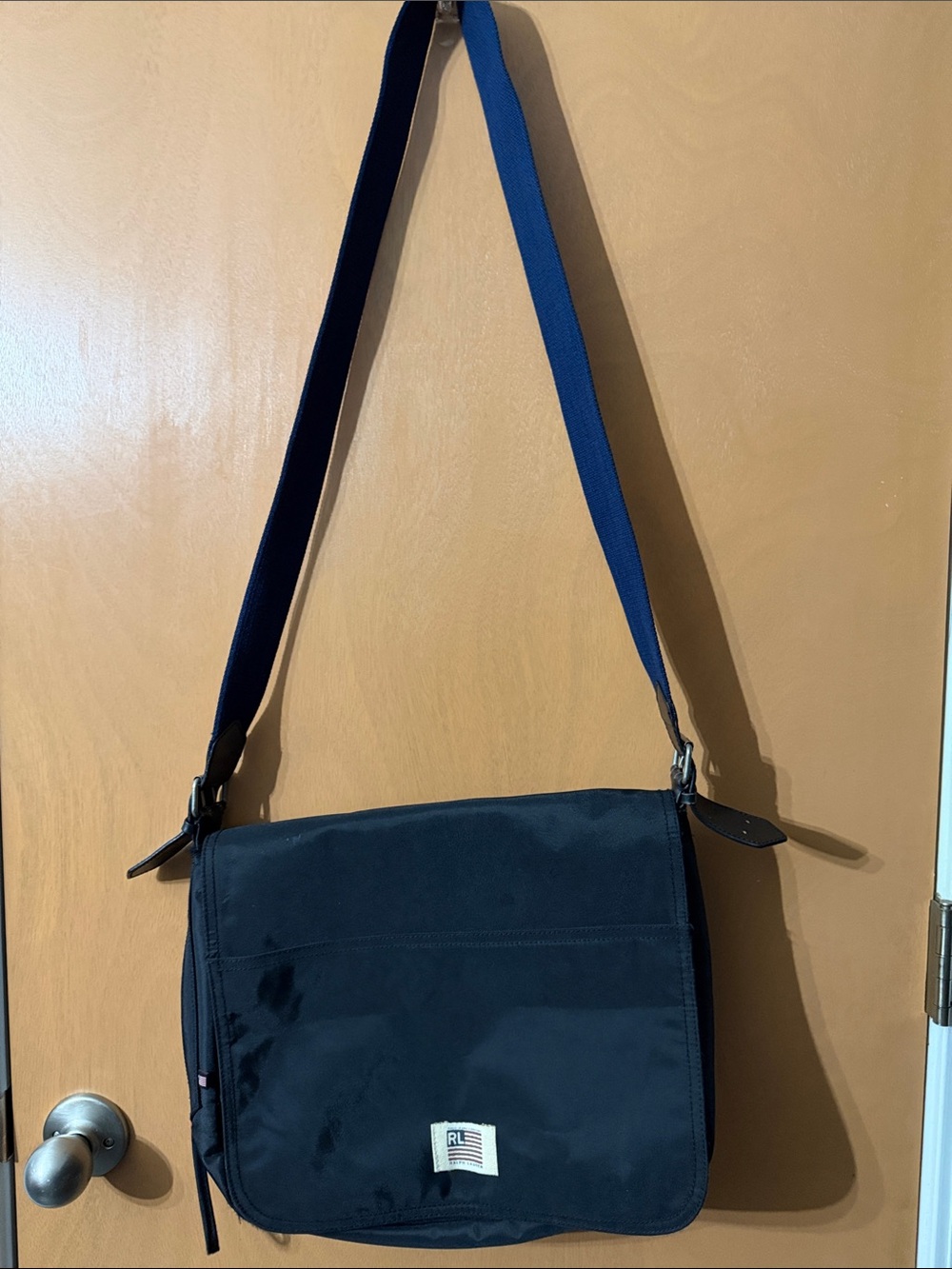 Black men’s Ralph Lauren Men's Messenger Bag with Adjustable red striped Strap